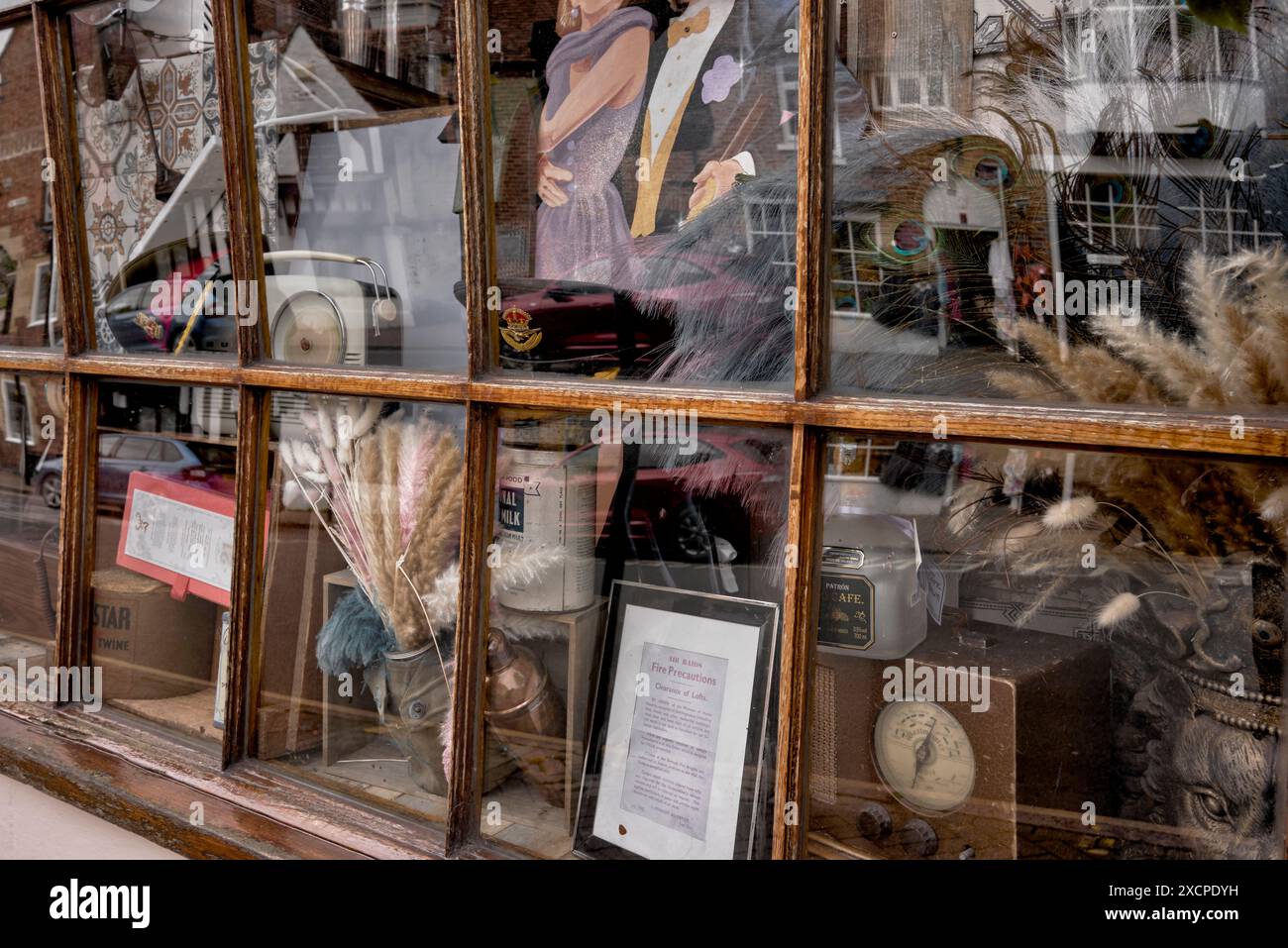 Antique shop window with a selection of vintage items. England, UK, Stock Photo