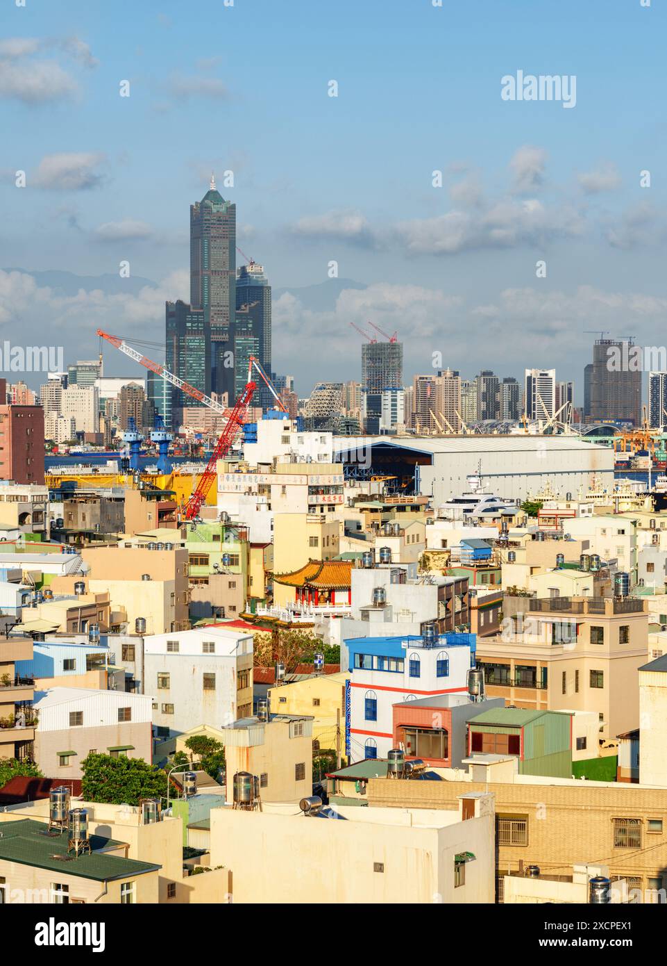 Kaohsiung, Taiwan - April 29, 2019: Awesome aerial view of Kaohsiung. 85 Sky Tower (Tuntex Sky Tower) is visible on blue sky background. Stock Photo