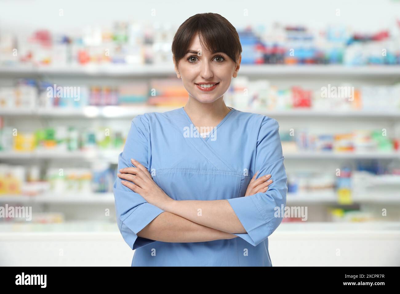 Blurred view female pharmacist hi-res stock photography and images - Alamy