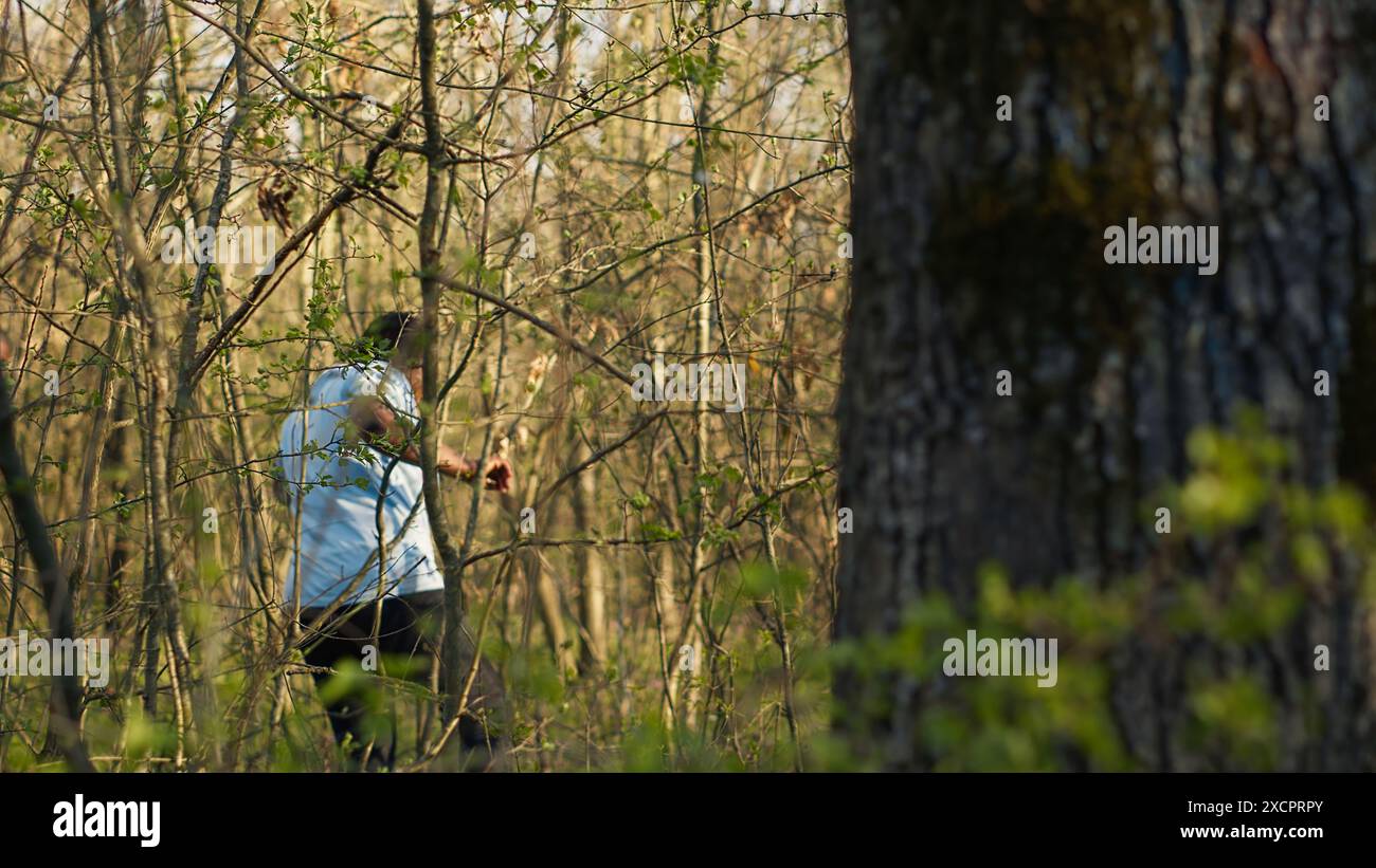 Civilian search party beginning the manhunt within the forest area ...