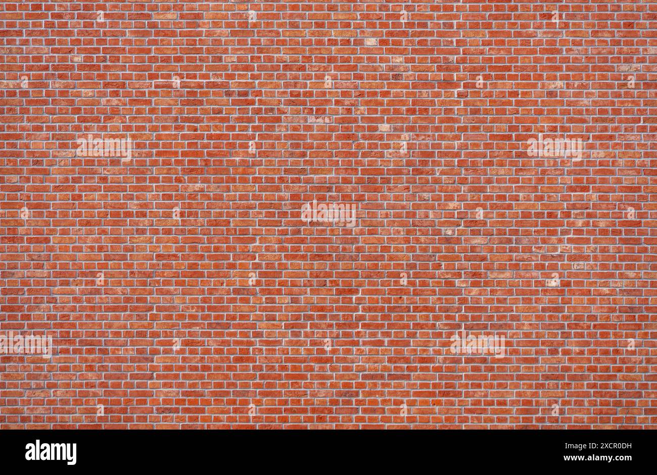 Full frame red brick wall backdrop Stock Photo