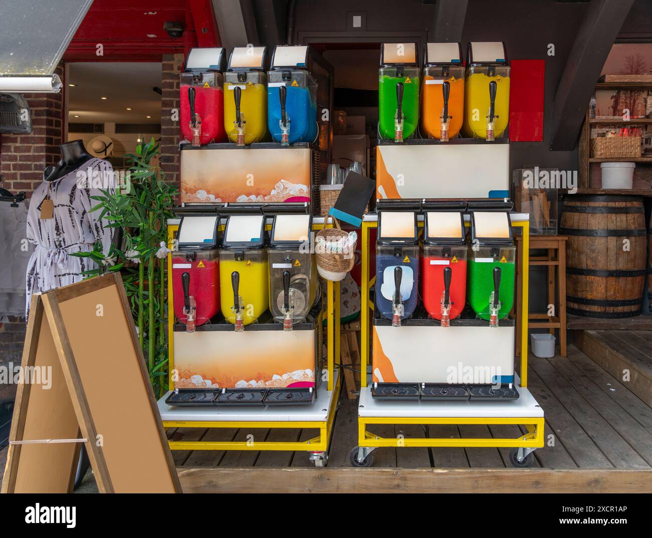 Slush machines with various colorful slush drinks seen at the Normandy region in France Stock Photo