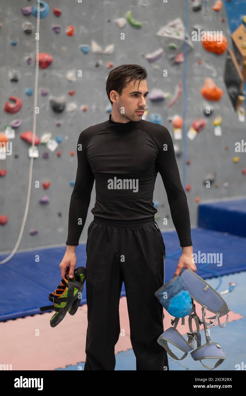 Rock climbing with his hands hi-res stock photography and images - Alamy