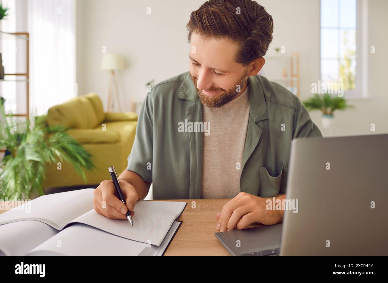 Positive Student Studying Or Working Remotely Stock Photo