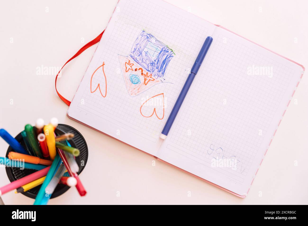 Children's drawing in a notebook drawn with a felt-tip pen Stock Photo ...