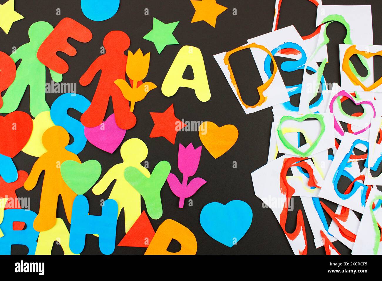 Cutting paper figures with various shapes and colors Stock Photo