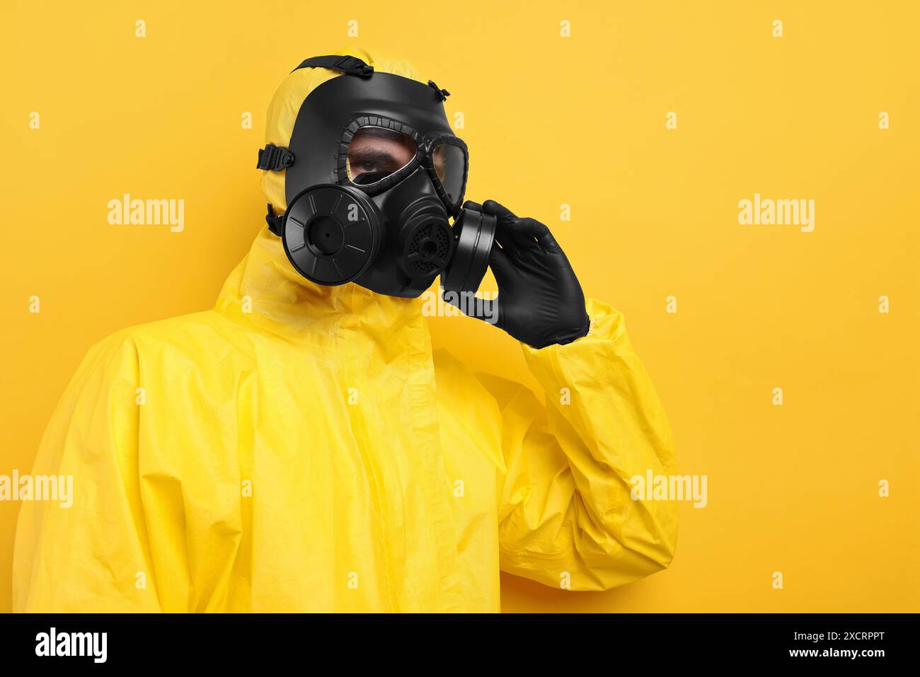 Person in gas mask yellow hi-res stock photography and images - Alamy