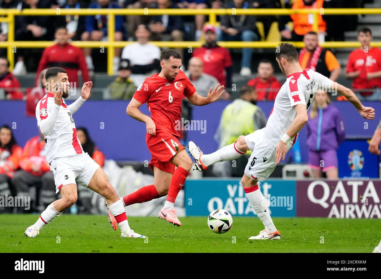 Turkey’s Orkun Kokcu in action against Georgia’s Georges Mikautadze ...