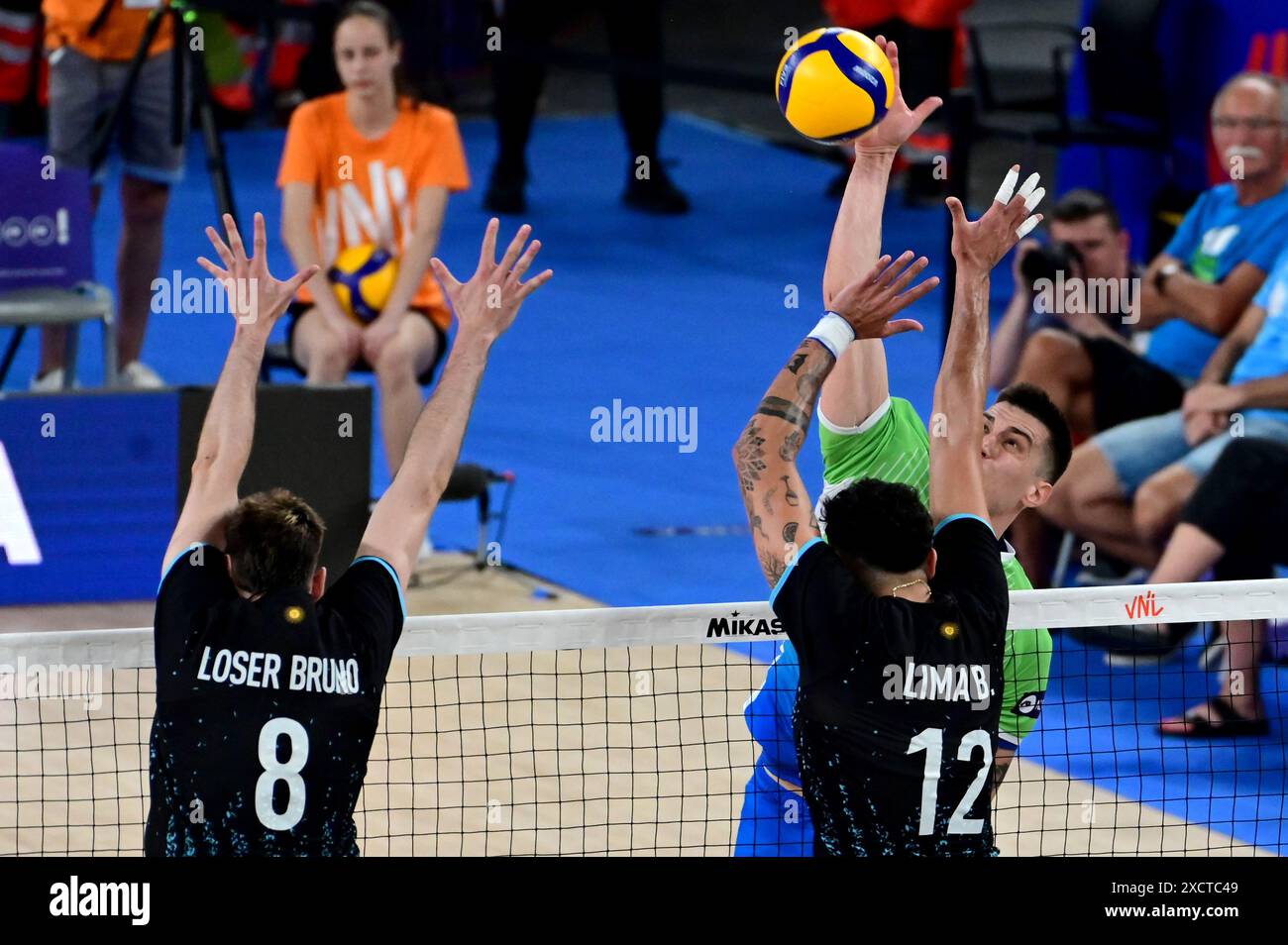 Ljubljana, Slovenia. 18th June, 2024. Ljubljana, Slovenia, June 18st 2024: Jan Kozamernik of Slovenia (R) in action against Bruno Lima of Argentina (C) during the FIVB Men's Volleyball Nations League match between Slovenia and Argentina at Arena Stozice, Ljubljana, Slovenia. (Igor Kupljenik/SPP) Credit: SPP Sport Press Photo. /Alamy Live News Stock Photo