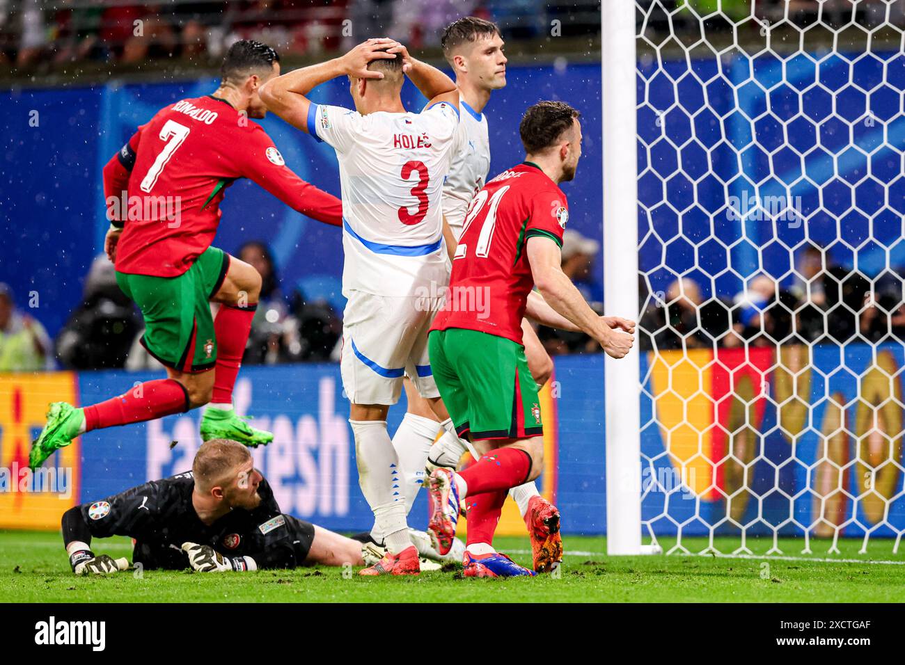 Leipzig, Germany. 18th June, 2024. LEIPZIG, GERMANY - JUNE 18: Tomas Holes of Czechia looks dejected over own goal of Robin Hranac of Czechia, Diogo Jota of Portugal and Cristiano Ronaldo of Portugal celebrating goal, Goalkeeper Jindrich Stanek of Czechia during the Group F - UEFA EURO 2024 match between Portugal and Czechia at Red Bull Arena on June 18, 2024 in Leipzig, Germany. (Photo by Peter Lous/BSR Agency) Credit: BSR Agency/Alamy Live News Stock Photo