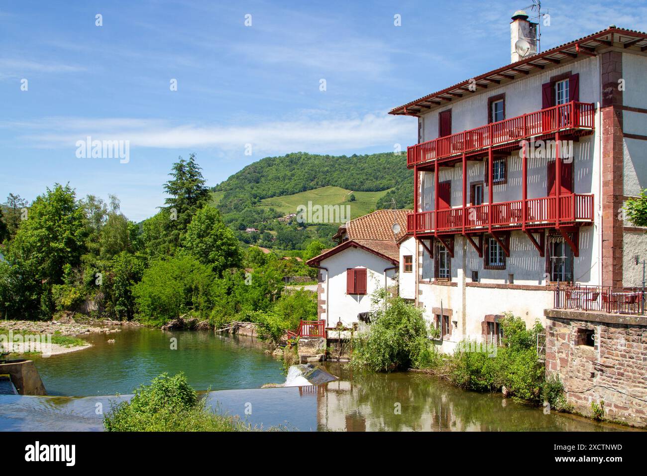 The river Nive flowing through the French town of Saint-Jean-Pied-de-Port the traditional start of the Camino de Santiago the way of St James walk Stock Photo