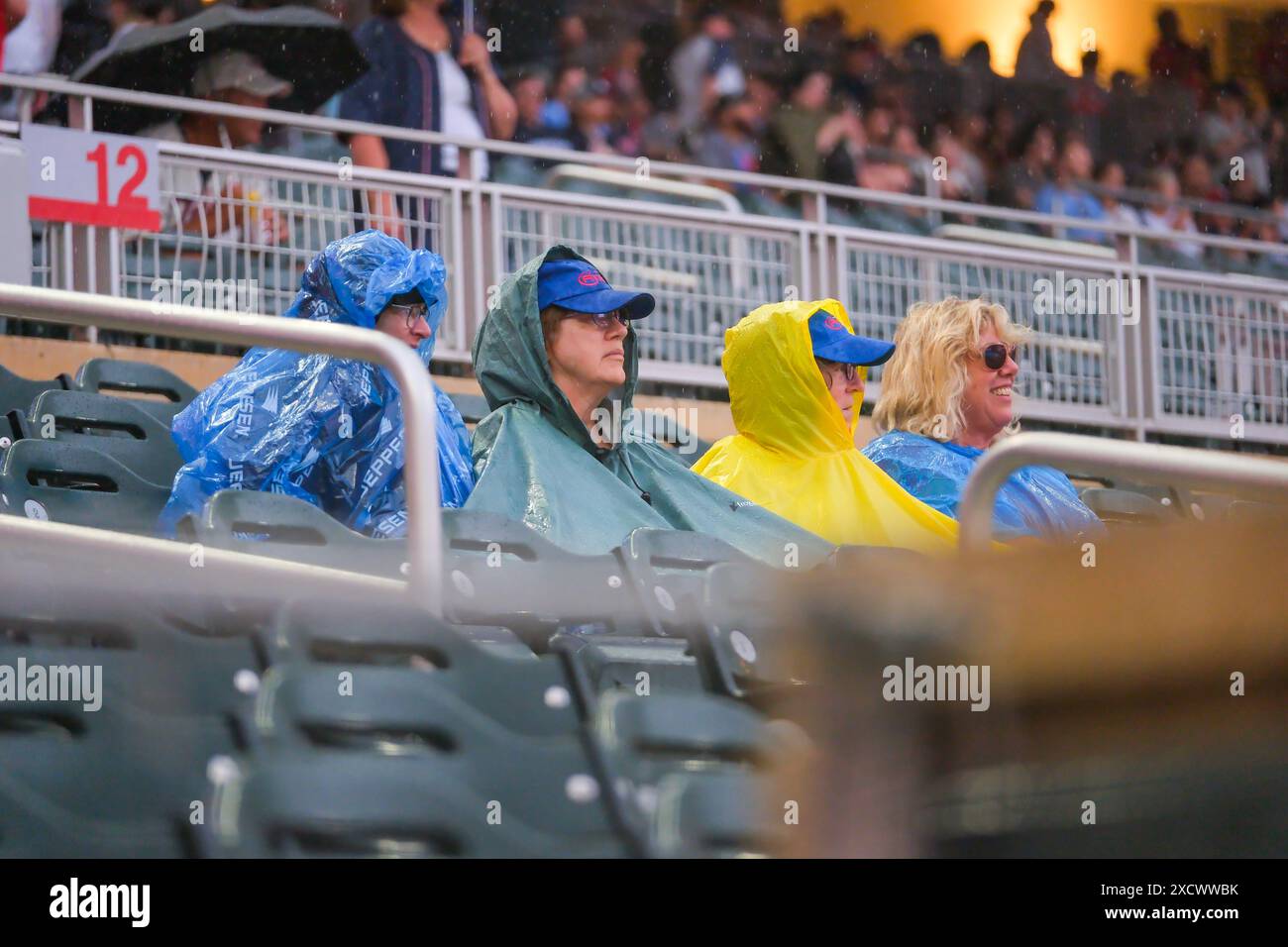 Baseball fans sit in hi-res stock photography and images - Alamy