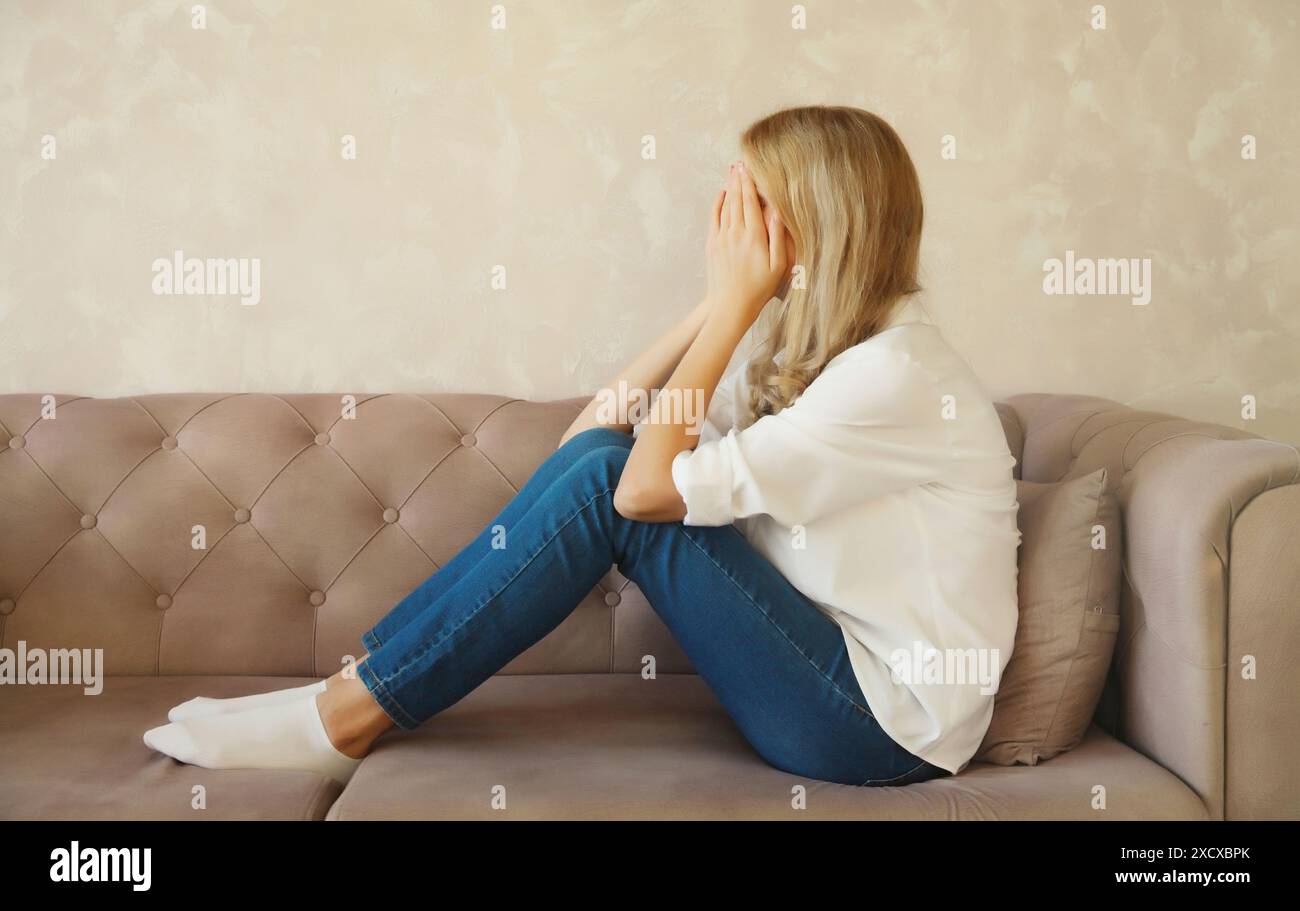 Woman head in hands abuse hi-res stock photography and images - Alamy