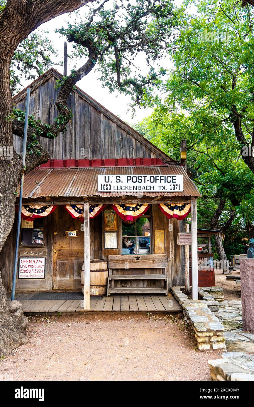 Exterior of 19th century western style general store / US Post Office building in Luckenbach, Texas, USA Stock Photo
