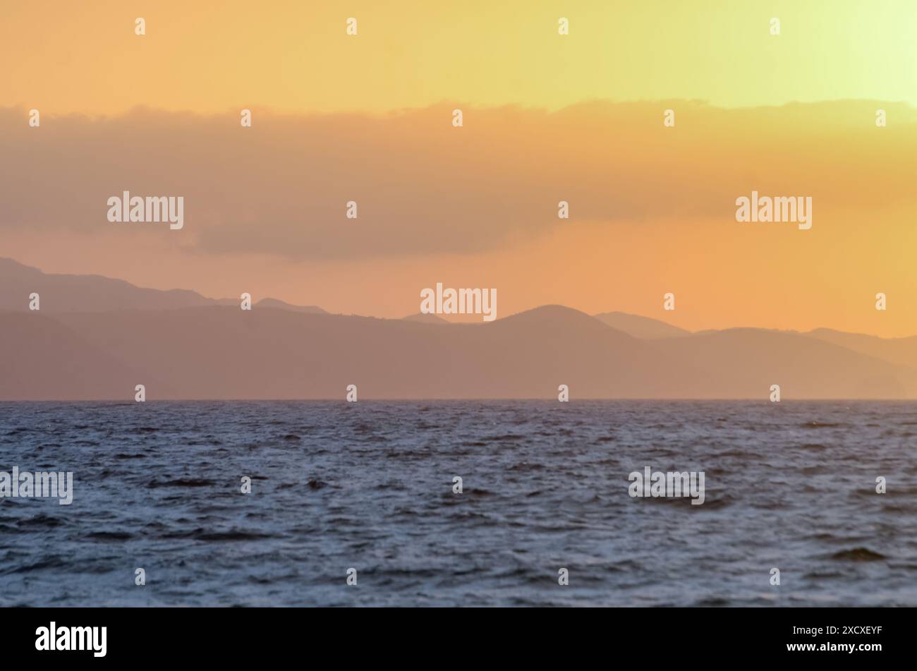 Rock formations near the beach with soft sunset light Stock Photo - Alamy