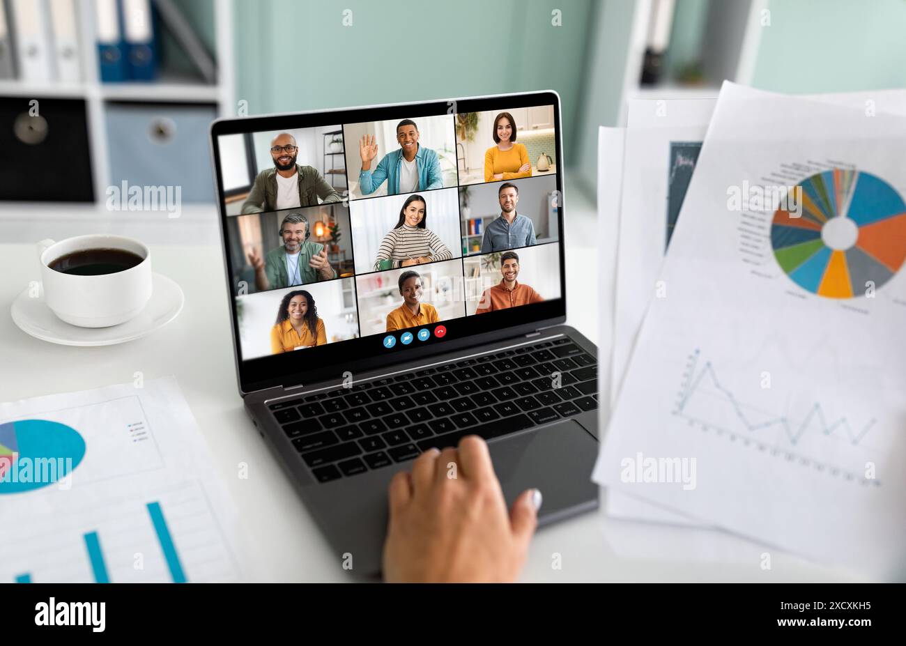 Business Team Participating in a Video Conference Meeting Stock Photo ...