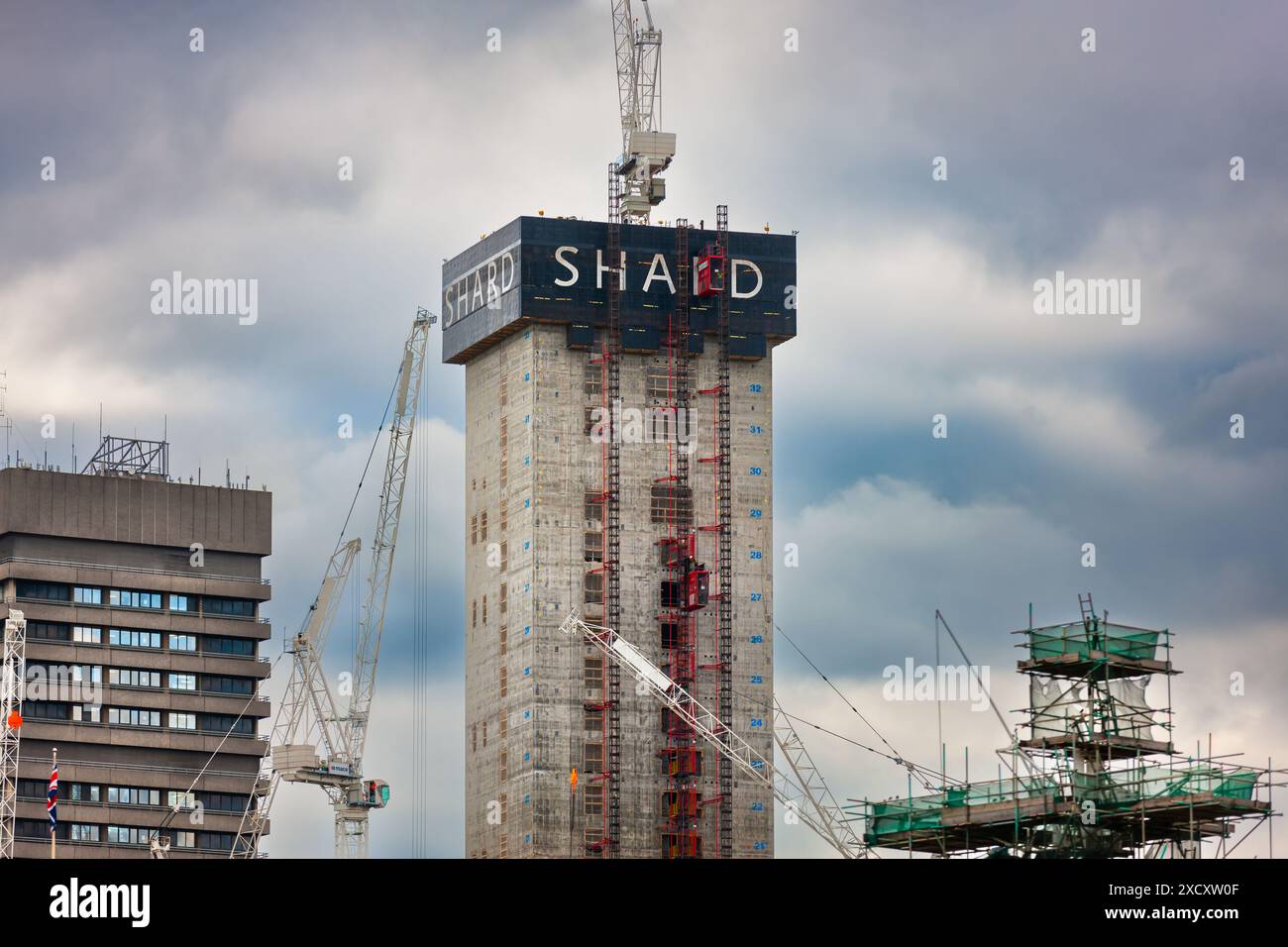 London, United Kingdom - July 2, 2010 : Building of The Shard. Construction of the future 87 floor skyscraper on south side River Thames. Stock Photo