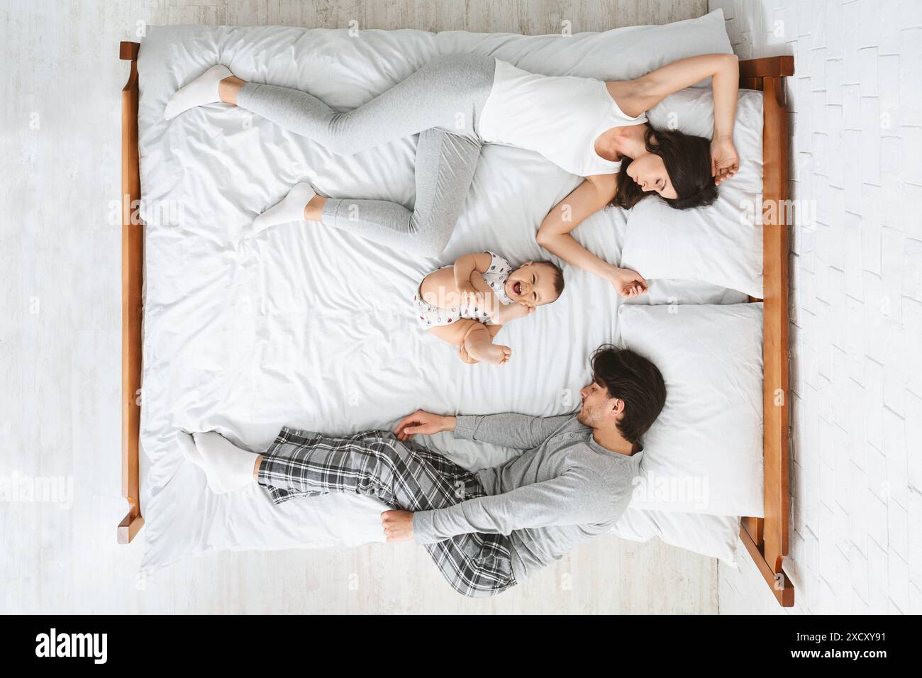 Portrait sleeping baby parents hi-res stock photography and images - Alamy