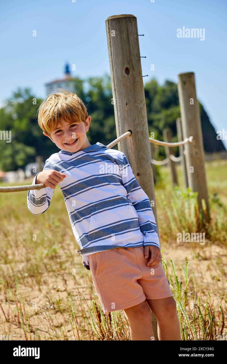 Child 5-10 years in the field, Zumaia, Gipuzkoa, Basque Country, Spain Stock Photo