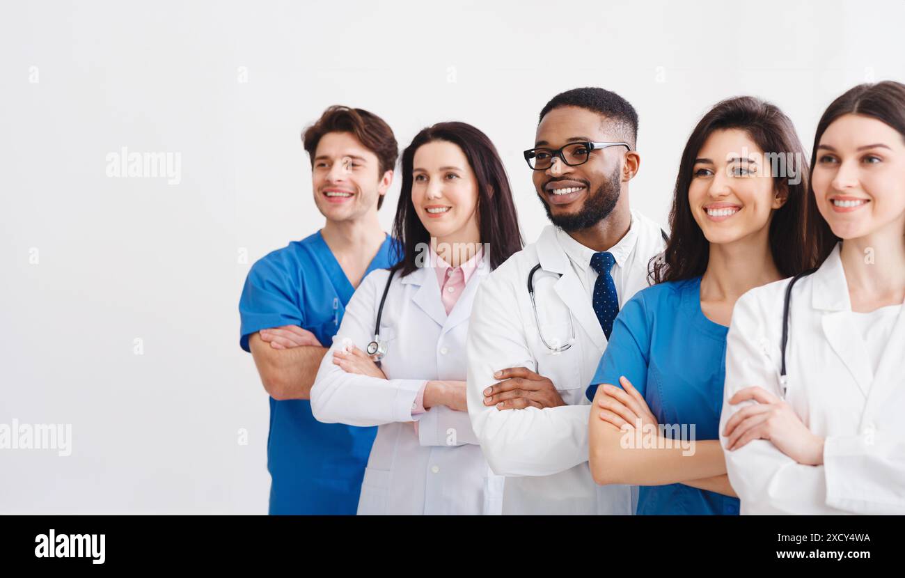 Young Professional Doctors Standing Together In Laboratory Stock Photo