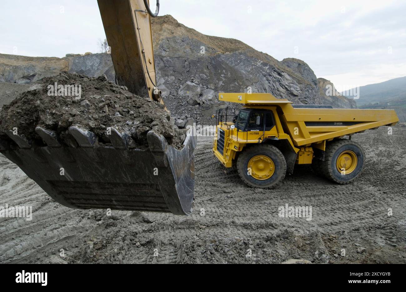 Loading rocks at quarry, Hydraulic Excavator, machinery for public ...