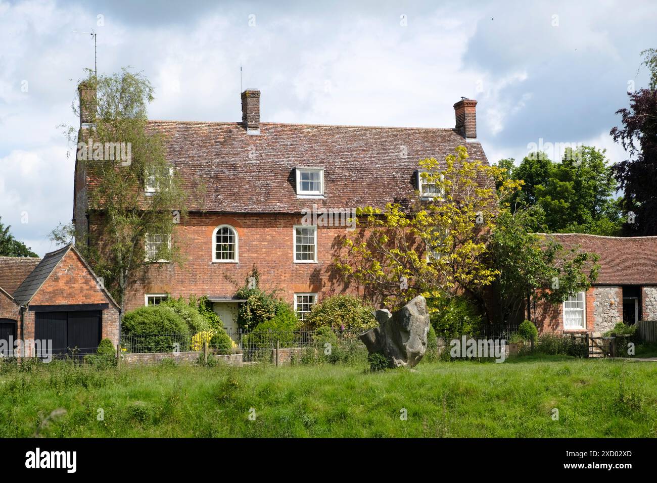 Red brick Cottage in Avebury village Wiltshire UK Stock Photo