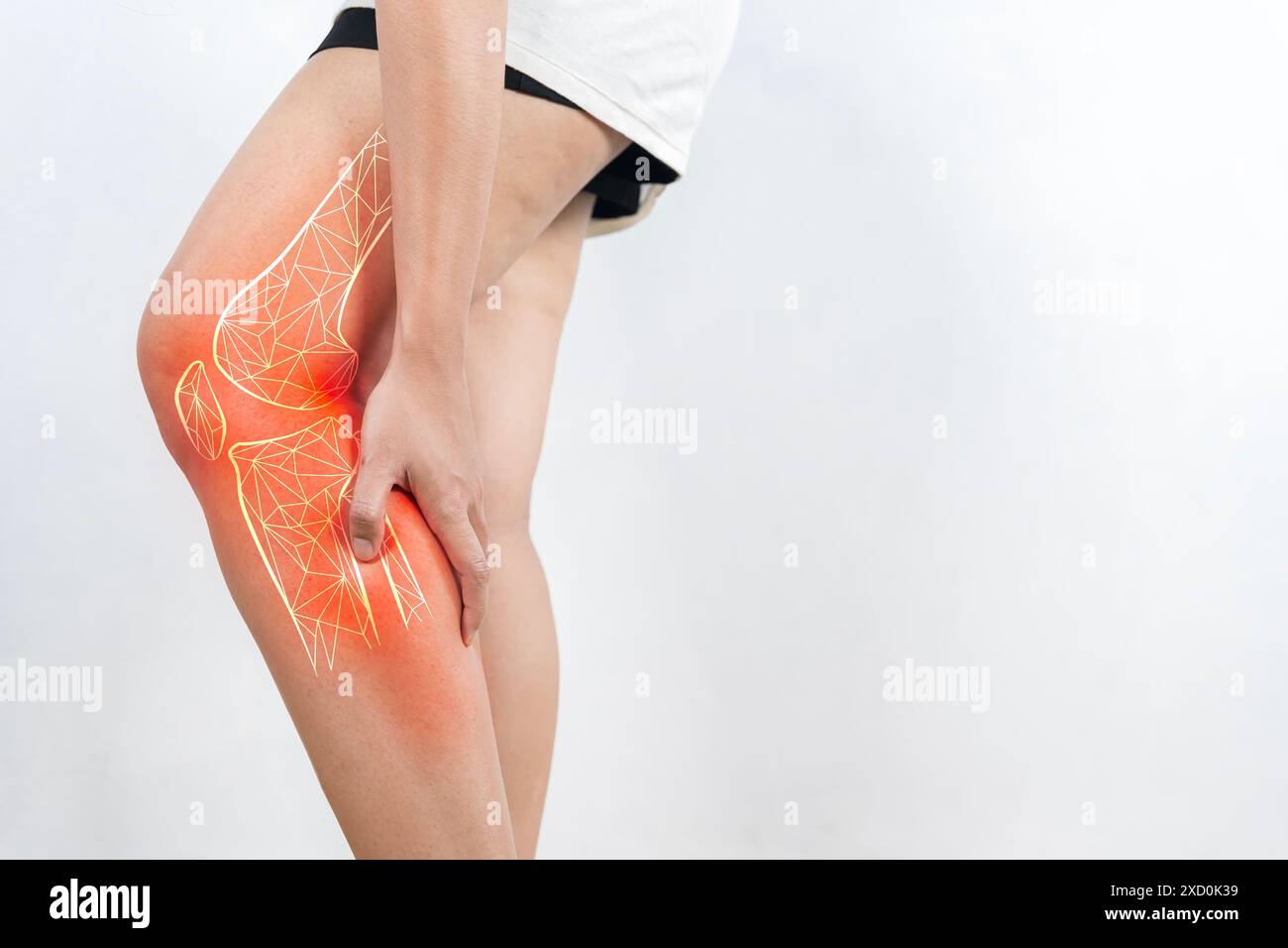 Elderly woman suffering from pain in knee. Tendon problems and Joint inflammation on white background. Stock Photo
