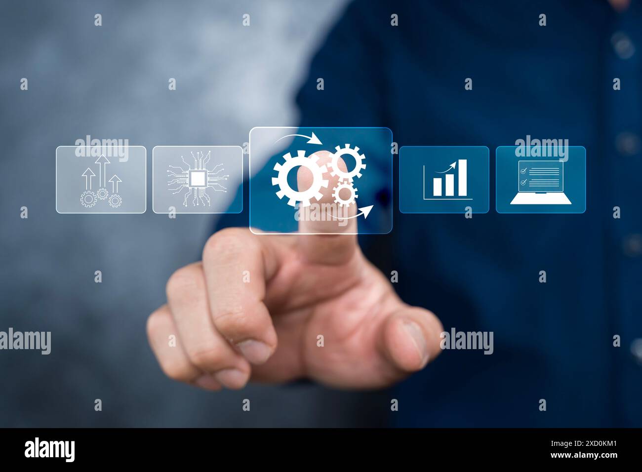 Business process automation concept. Businessman touching Automation software technology on virtual screen to optimise business process workflow. Stock Photo