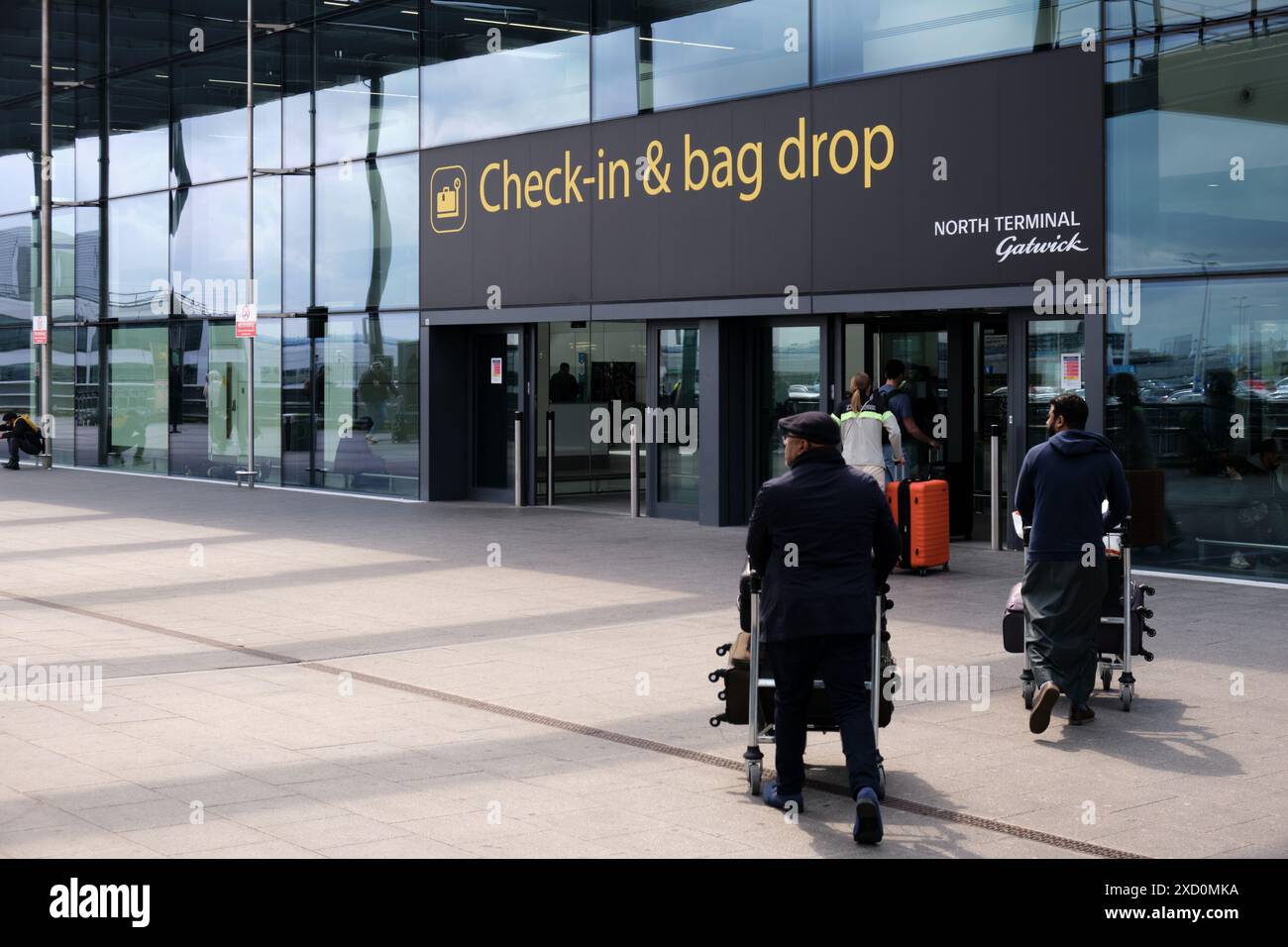Gatwick Airport, United Kingdom April 22 2024. Passengers with baggage
