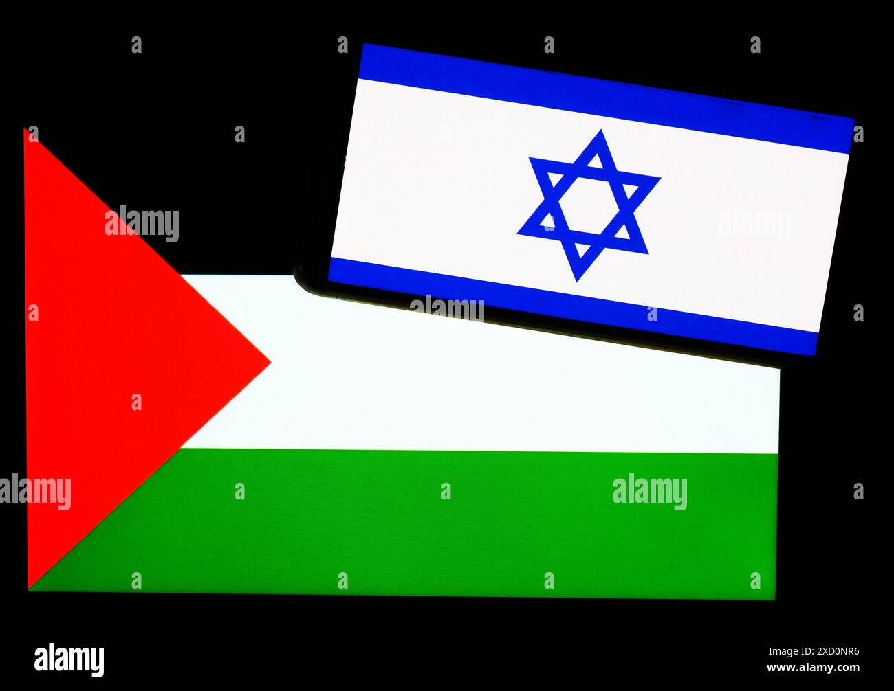 Ukraine - June 19, 2024: In this photo illustration, Israel Flag  seen displayed on a smartphone and Palestine flag on  tablet screen. Stock Photo