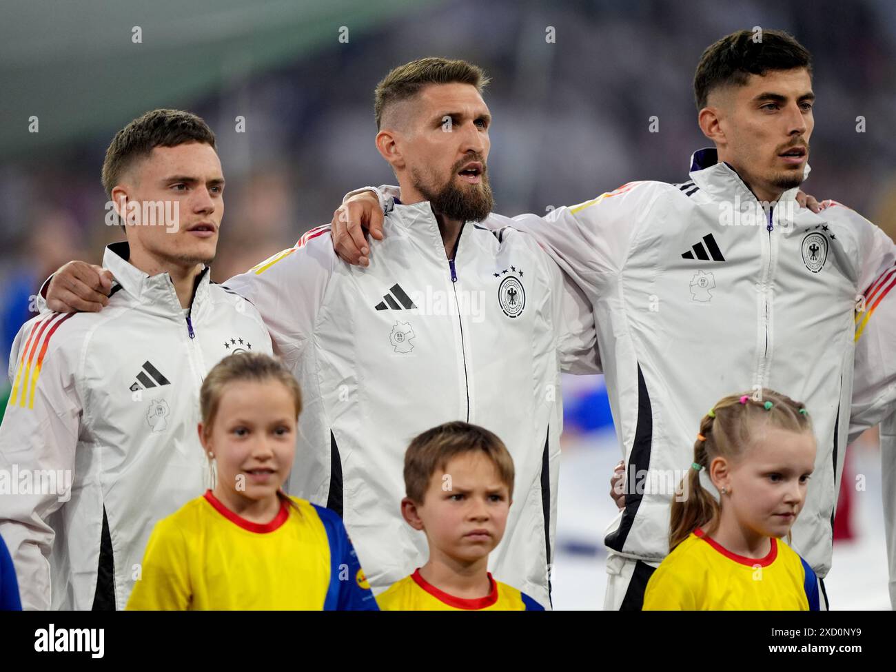 Germany's Florian Wirtz, Robert Andrich and Kai Havertz ahead of the