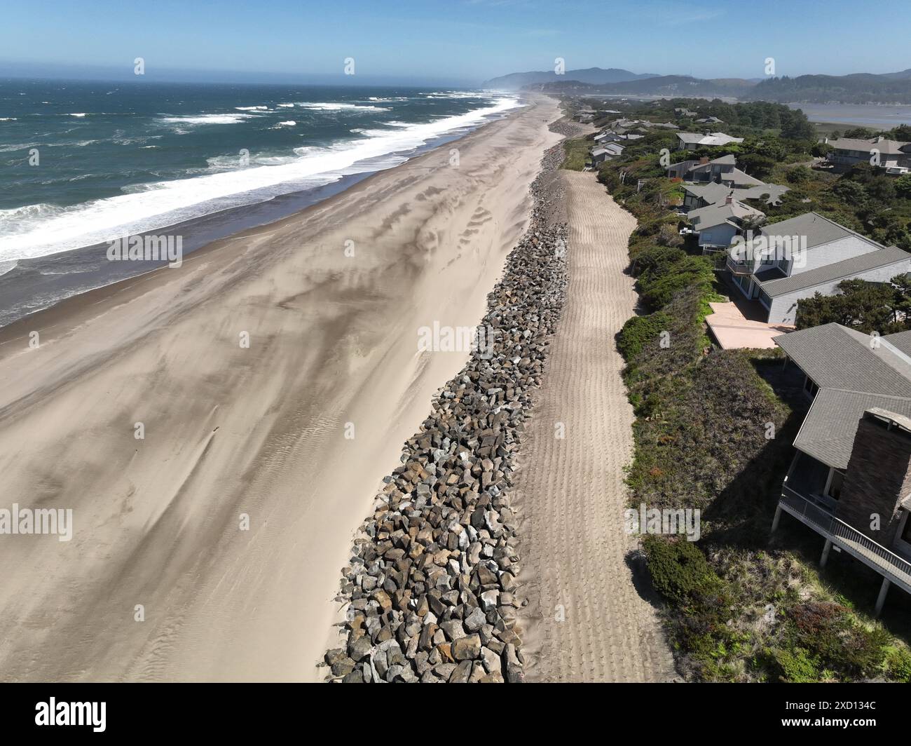 Beach erosion, mitigation,restoration and riprap construction at Salishan Oregon on the Pacific Ocean. Stock Photo
