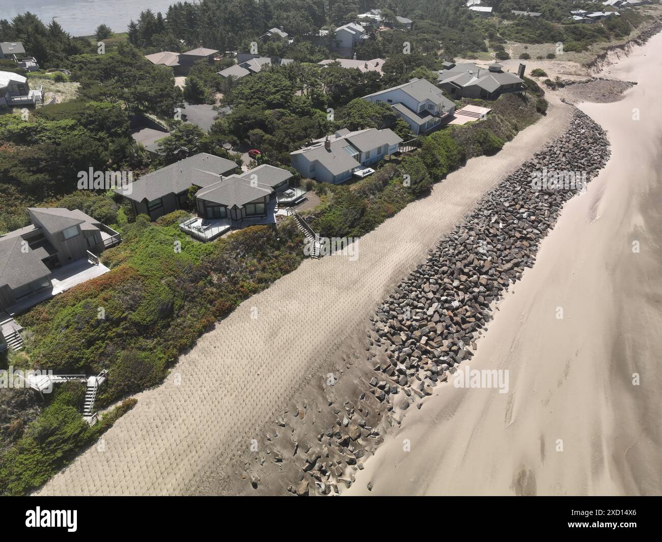 Beach erosion, mitigation,restoration and riprap construction at Salishan Oregon on the Pacific Ocean. Stock Photo