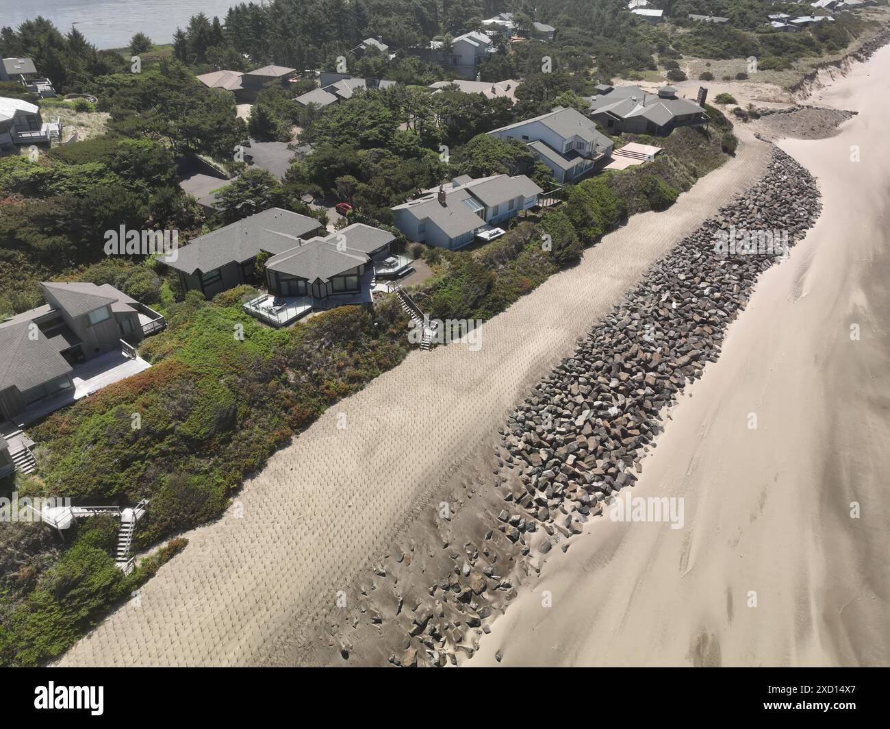 Beach erosion, mitigation,restoration and riprap construction at Salishan Oregon on the Pacific Ocean. Stock Photo
