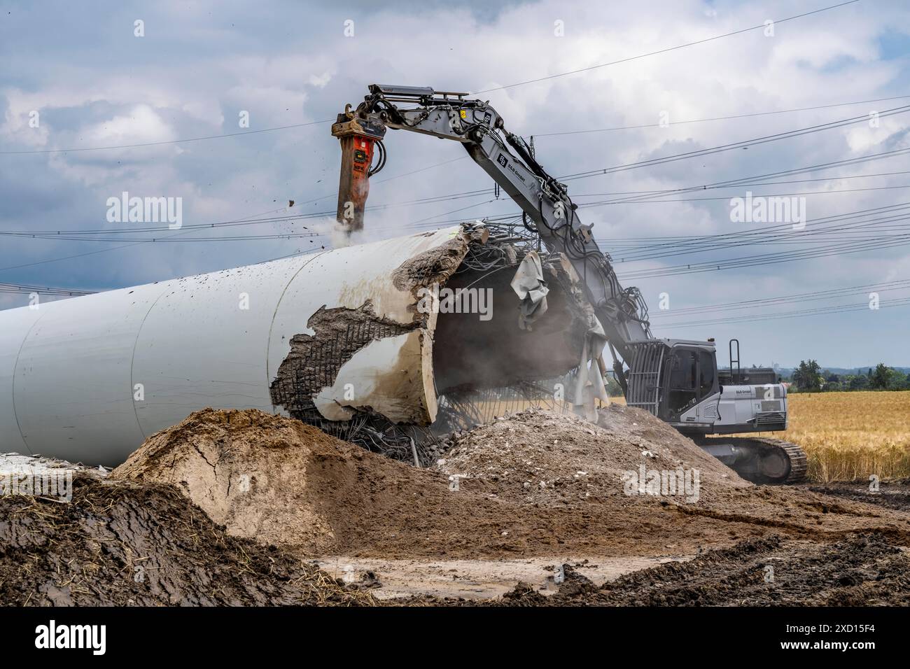 Demolished tower of a 20 year old wind turbine, in the Werl wind farm ...