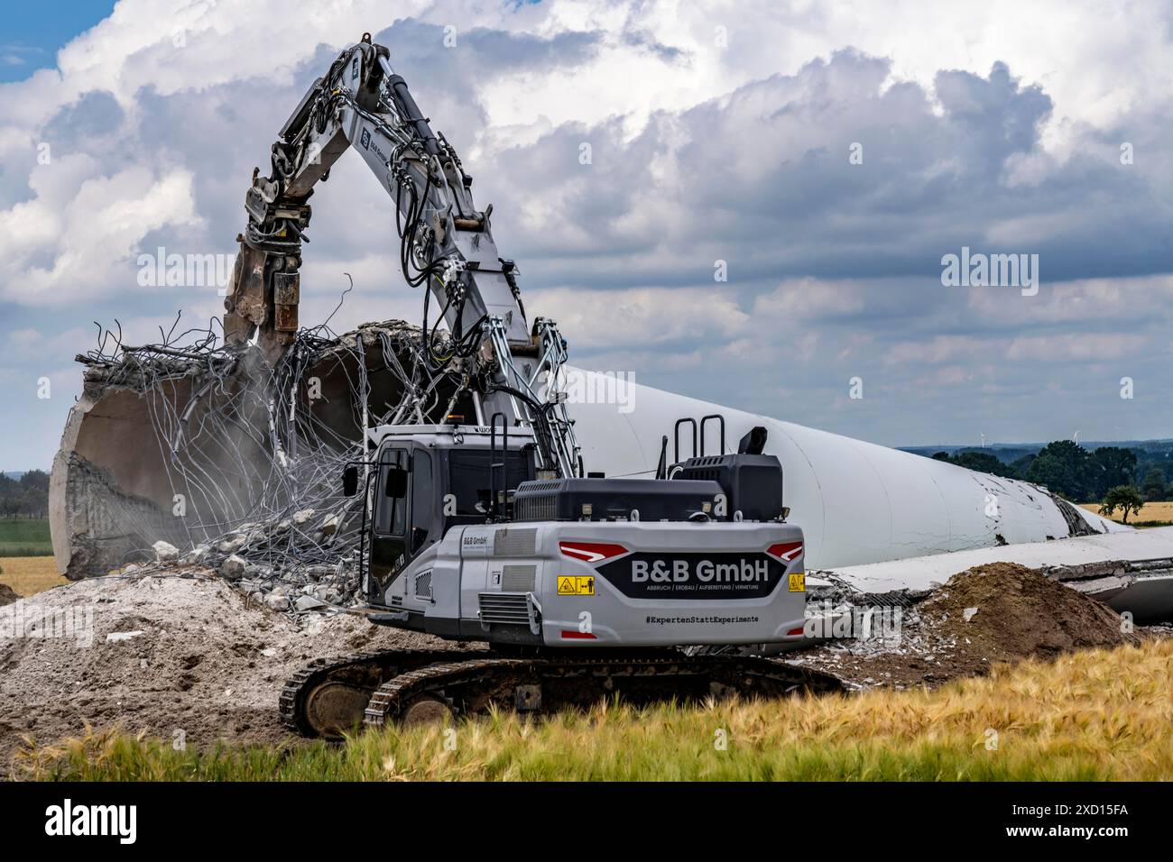 Demolished tower of a 20 year old wind turbine, in the Werl wind farm ...