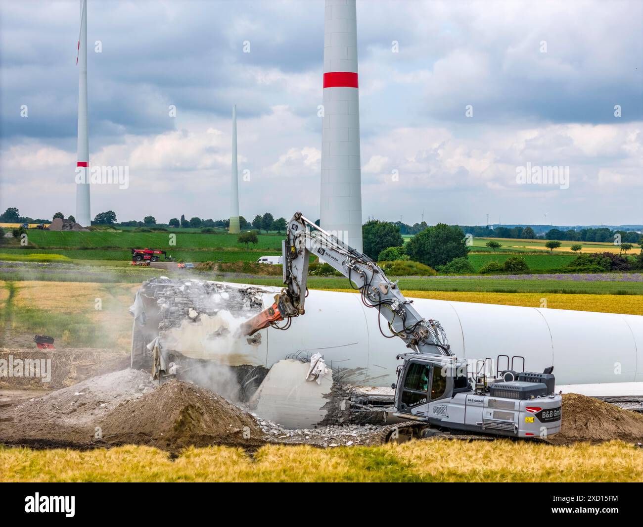 Demolished tower of a 20 year old wind turbine, in the Werl wind farm ...