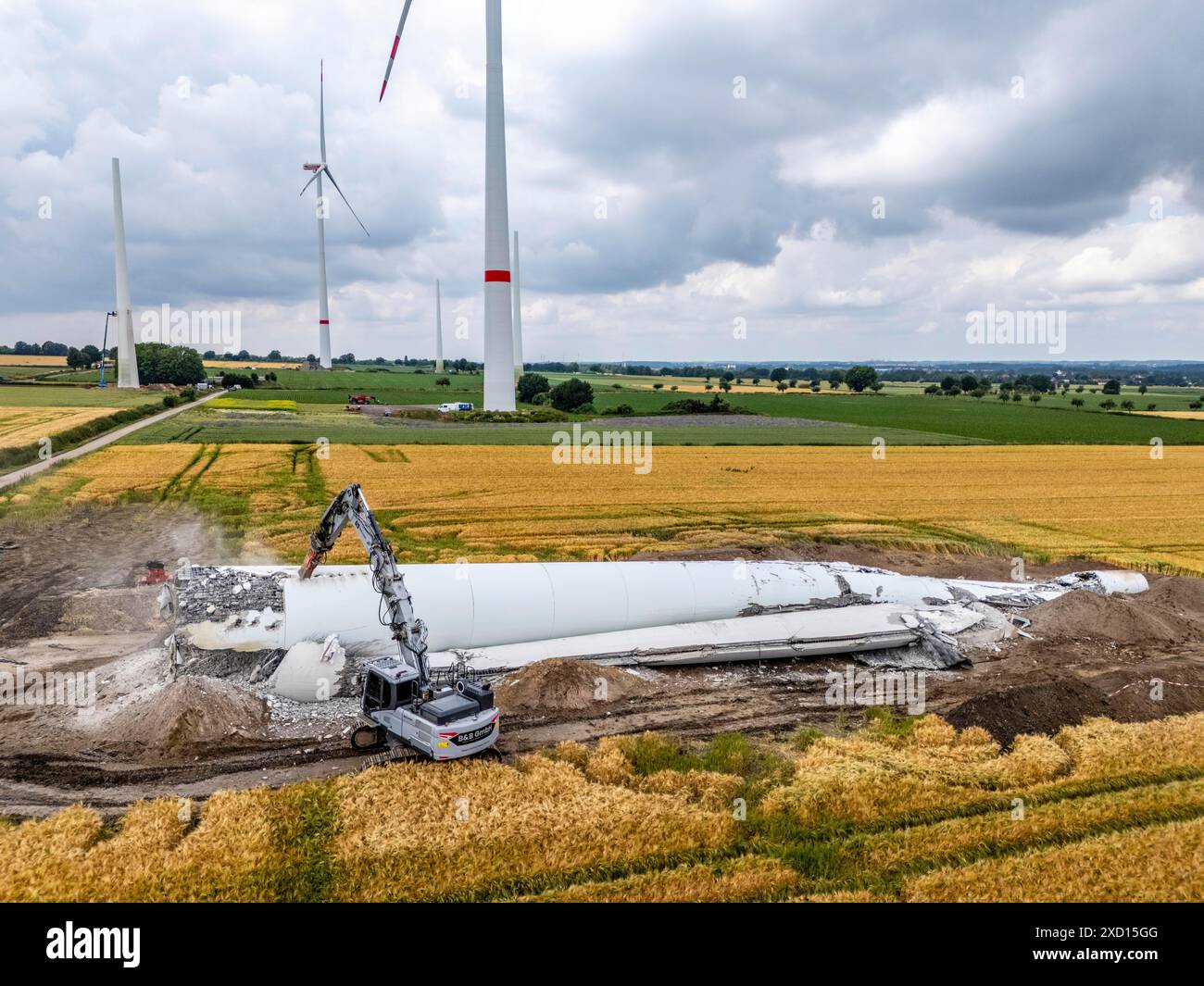 Demolished tower of a 20 year old wind turbine, in the Werl wind farm ...