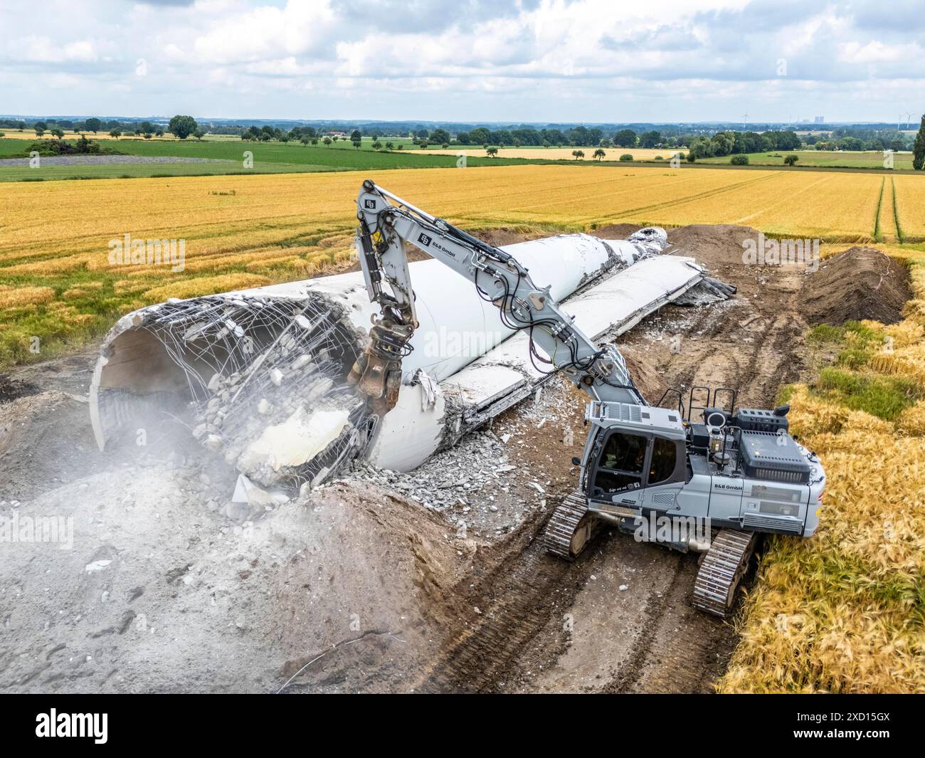 Demolished tower of a 20 year old wind turbine, in the Werl wind farm ...