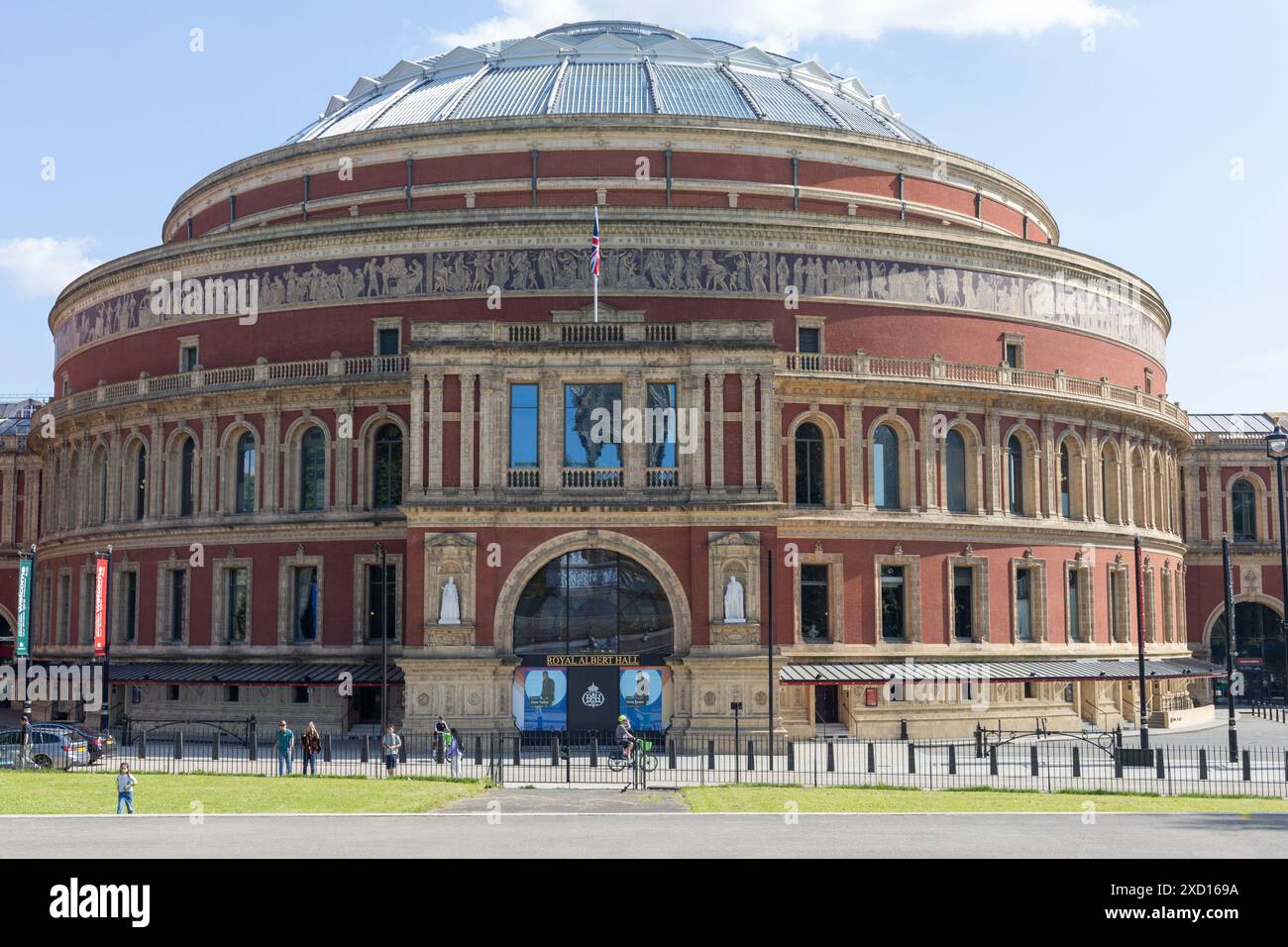 Front full view of the Royal Albert Hall on a sunny day.  The hall was opened in 1871, and was named after Prince Albert, Queen Victoria’s husband. Stock Photo