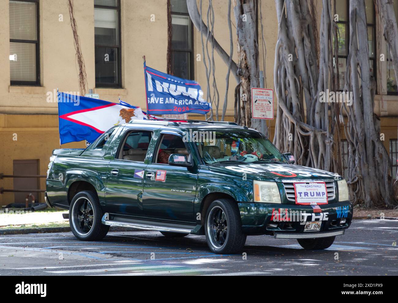 Trump Box On Rear End A pickup truck adorned with an array of Donald Trump support signs ...