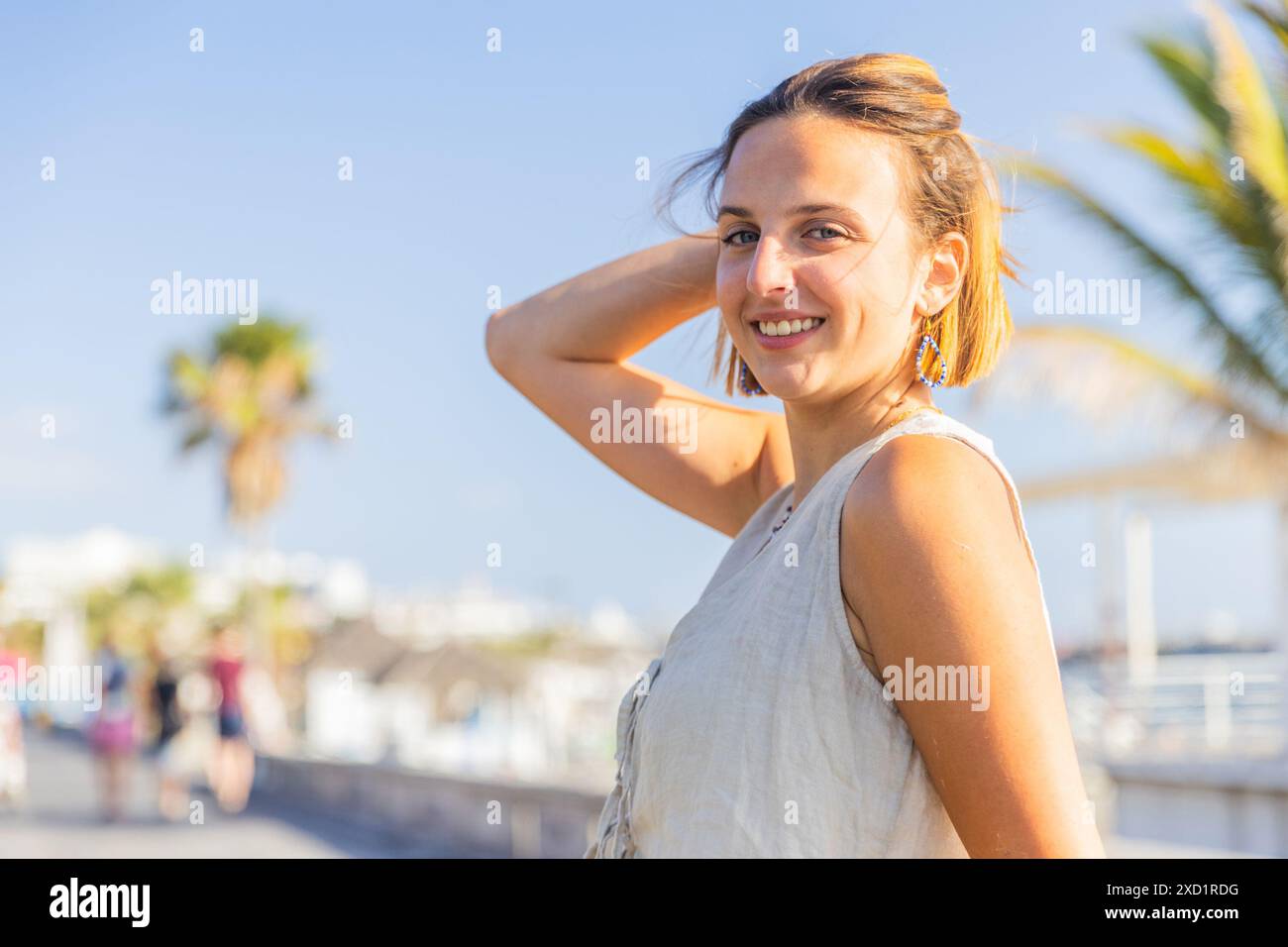 Woman in white tank top hi-res stock photography and images - Alamy