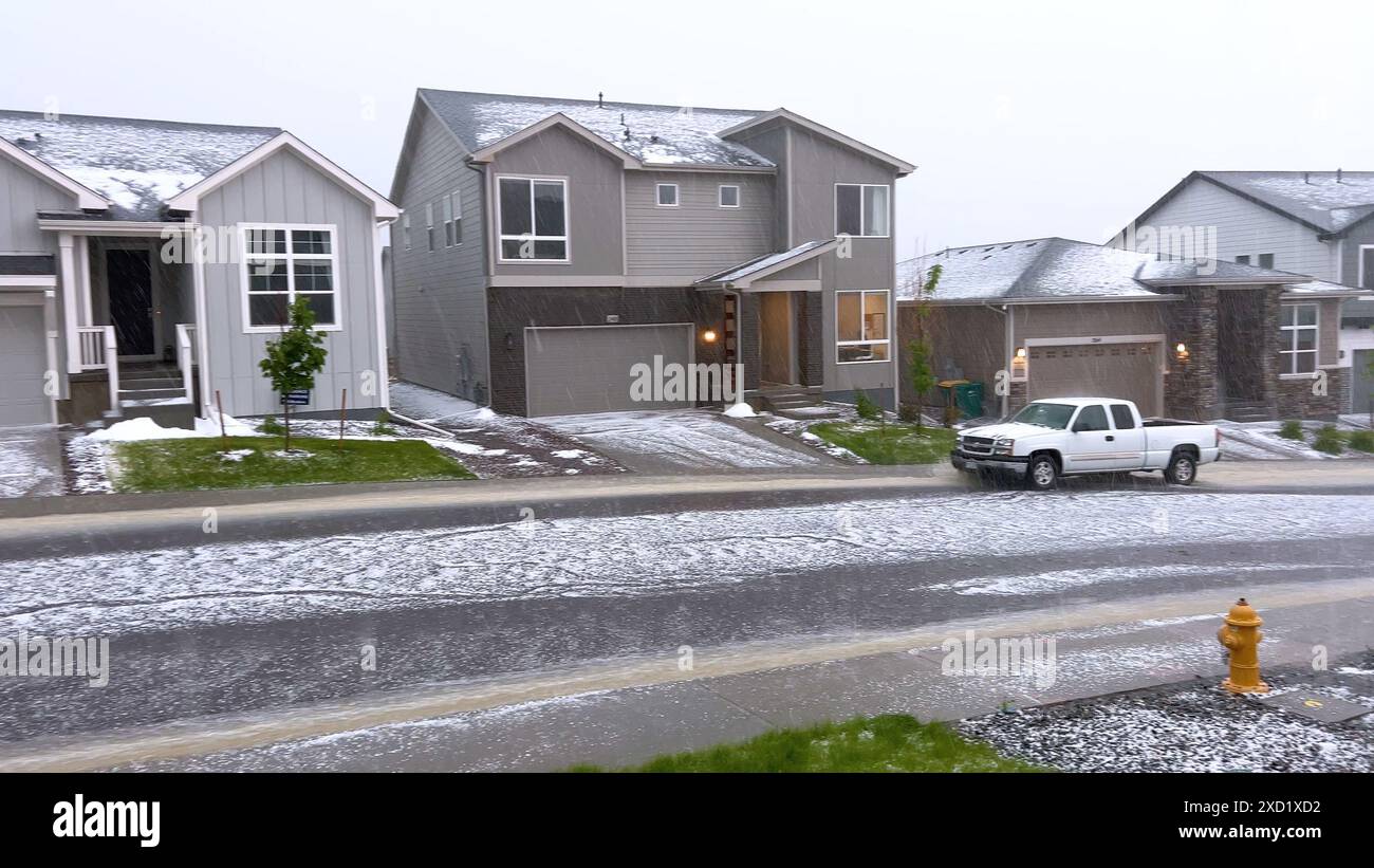 Suburban Neighborhood Covered in Hail After a Storm Stock Photo - Alamy