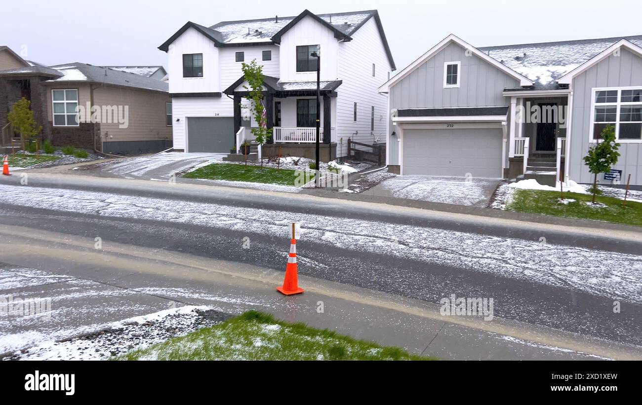Suburban Neighborhood Covered in Hail After a Storm Stock Photo - Alamy