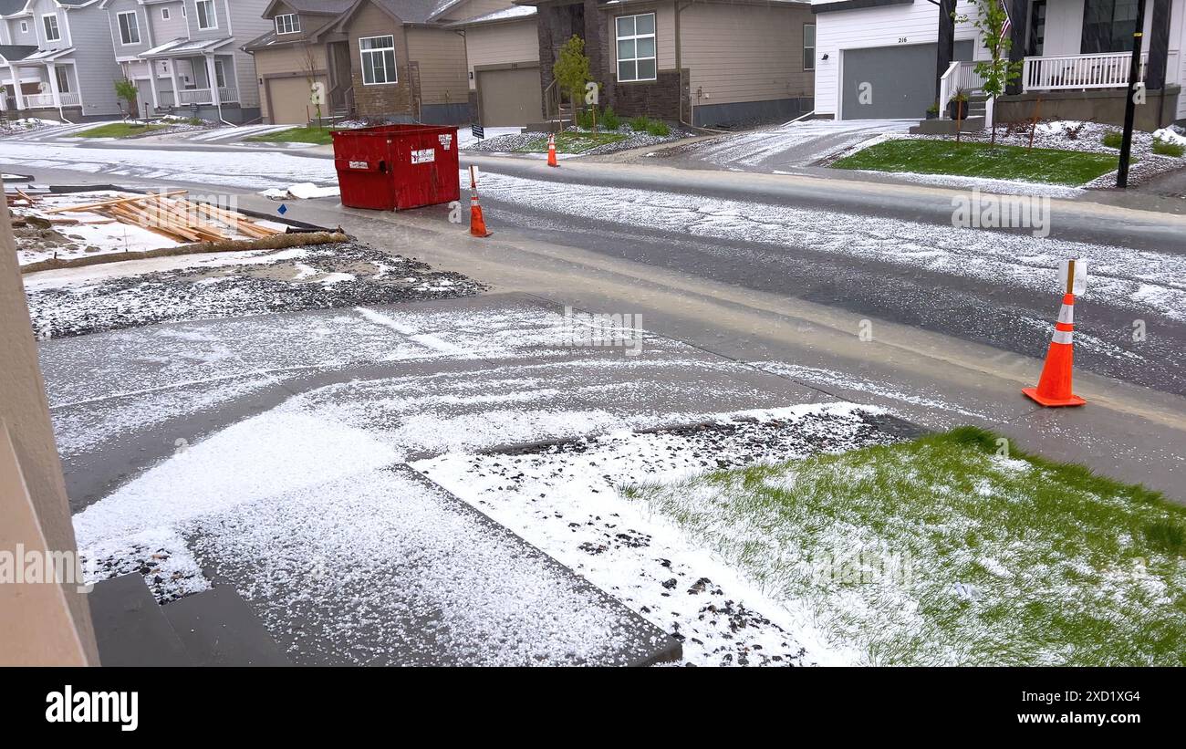 Suburban Neighborhood Covered in Hail After a Storm Stock Photo - Alamy