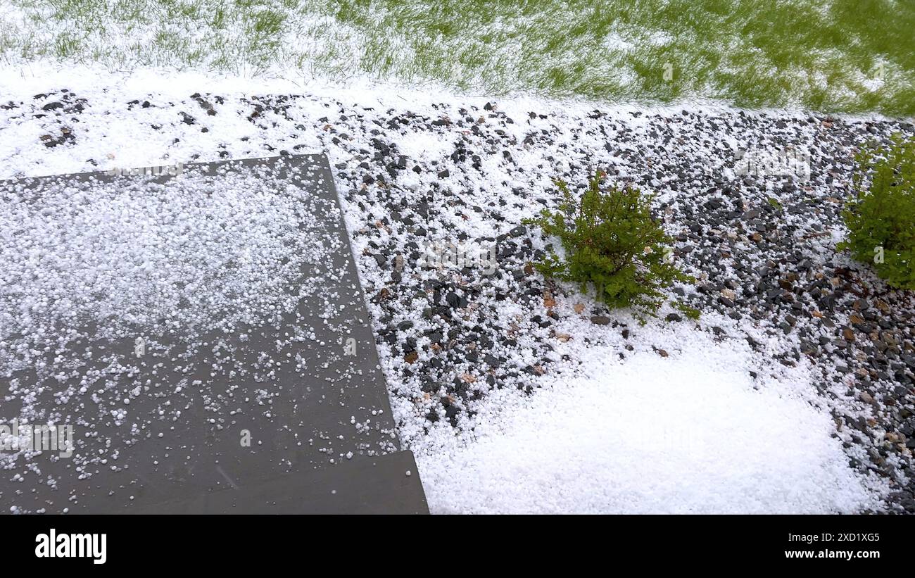 Suburban Neighborhood Covered in Hail After a Storm Stock Photo - Alamy