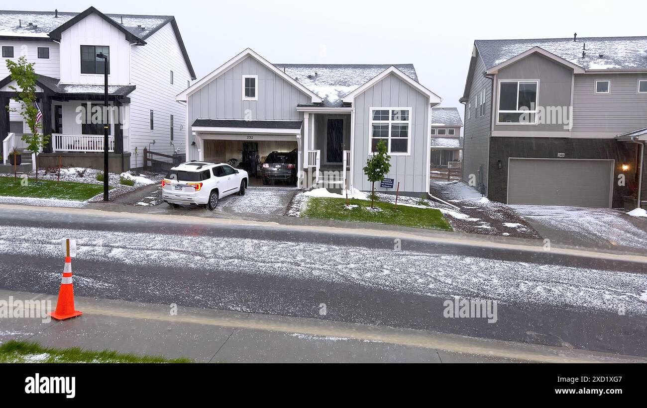 Suburban Neighborhood Covered in Hail After a Storm Stock Photo - Alamy