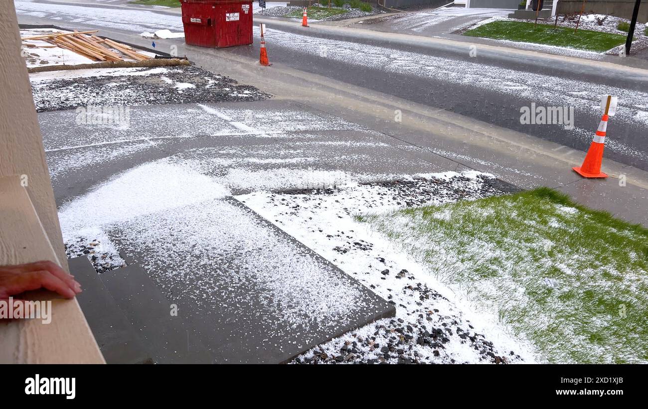 Suburban Neighborhood Covered in Hail After a Storm Stock Photo - Alamy