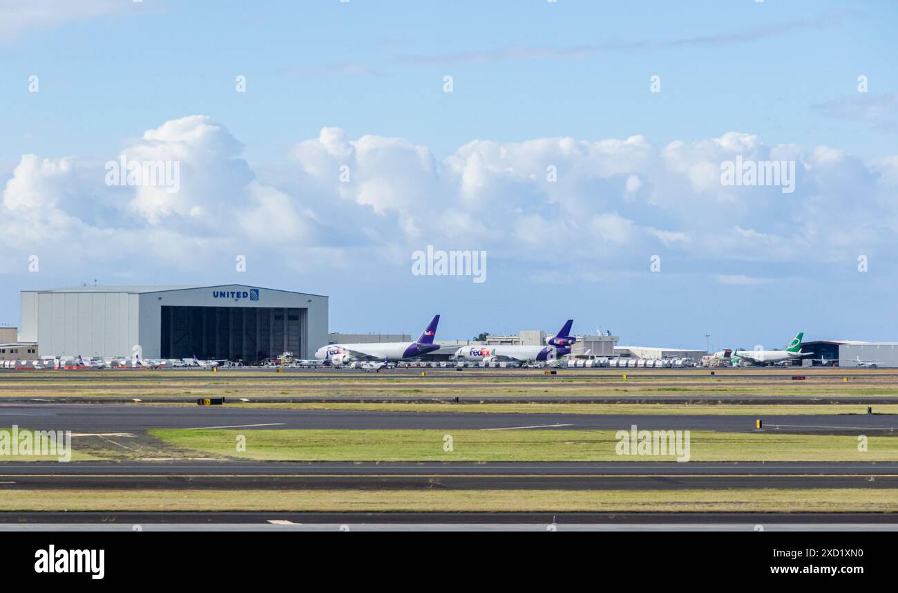 View across the tarmac of  the United Airlines hangar at Daniel K. Inouye International Airport. Stock Photo