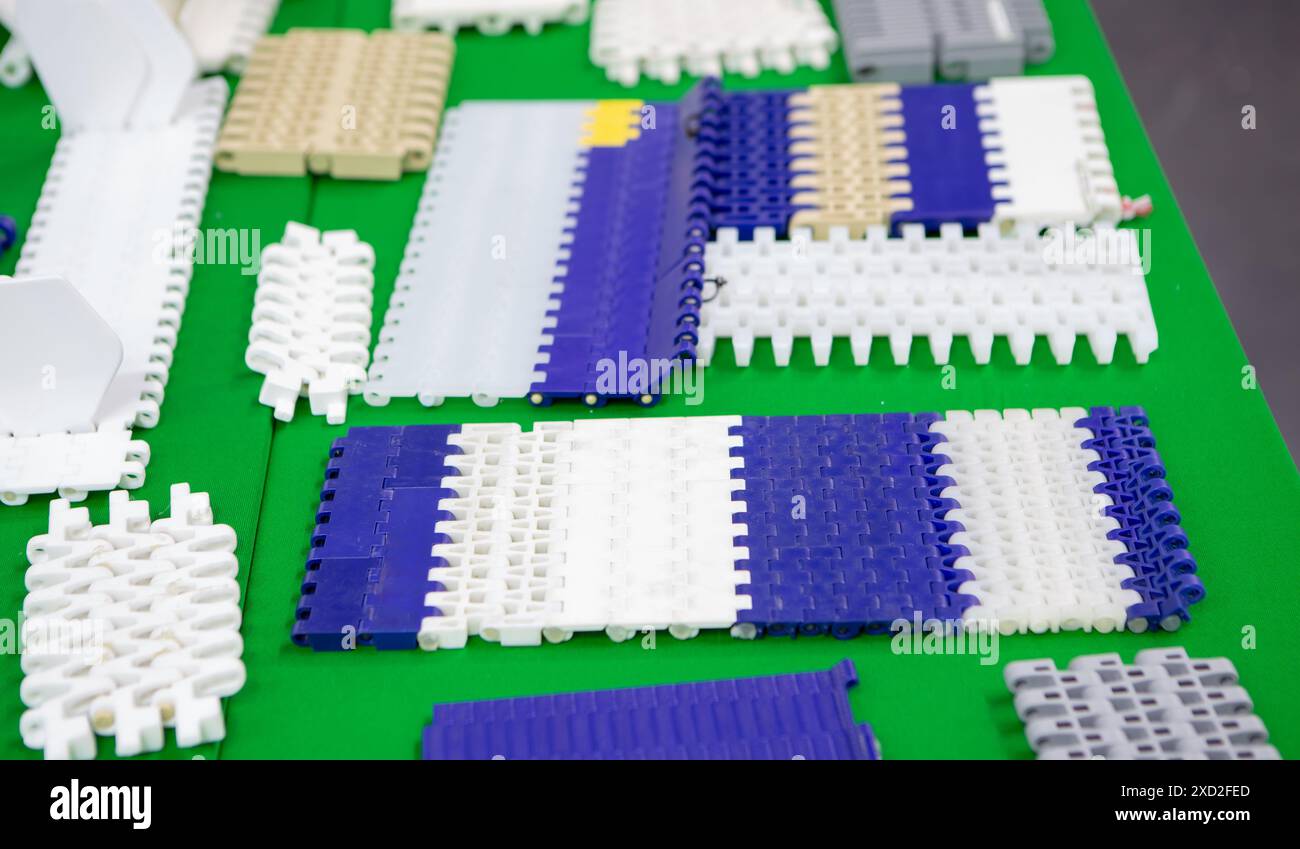 Plastic belt conveyor for food industry production line. Stock Photo